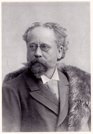 black and white photograph, half-length portrait of Gustav Kogel, facing left.